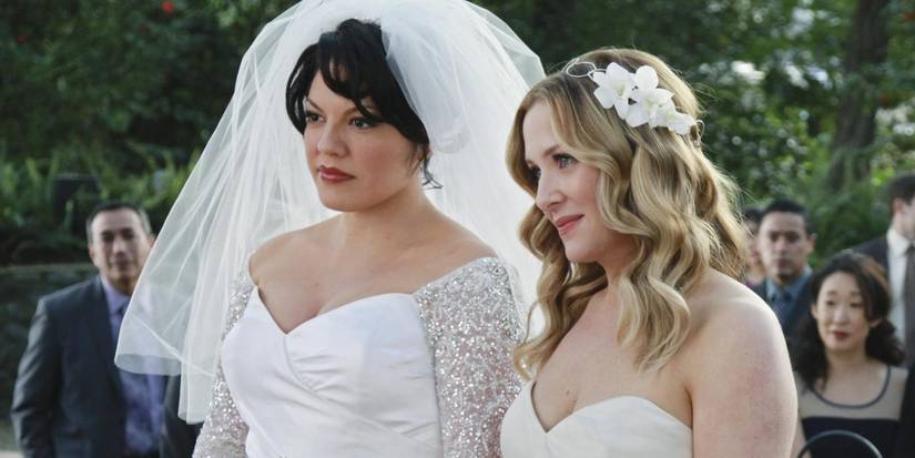 Sara Ramirez and Jessica Capshaw as Callie and Arizona at their wedding in Grey's Anatomy.