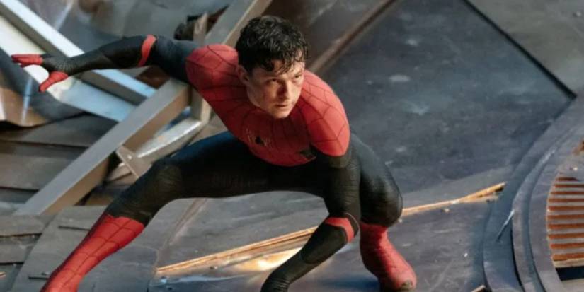 Tom Holland in his Spider-Man uniform with the mask off in Spider-Man: No Way Home.