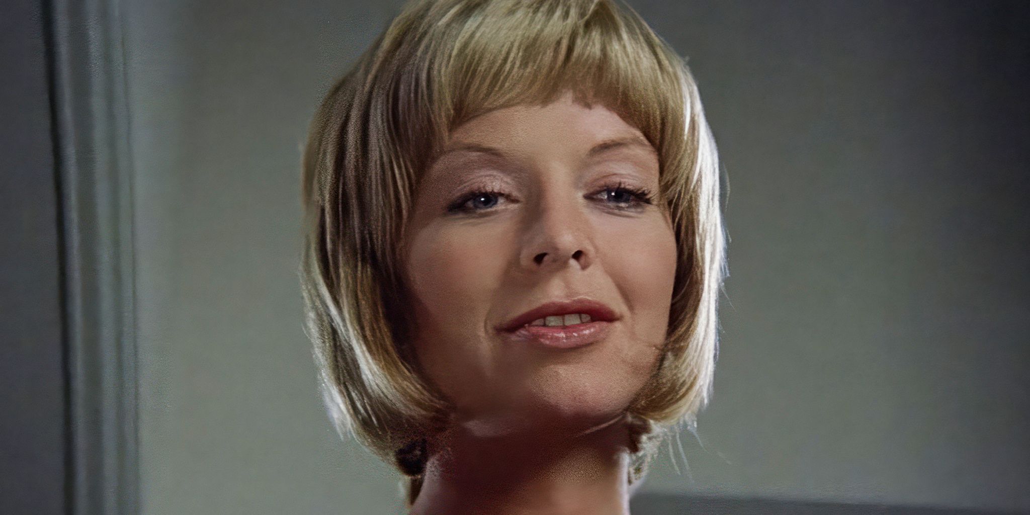 Susannah York as Cathryn, looking down at someone slyly in Images.