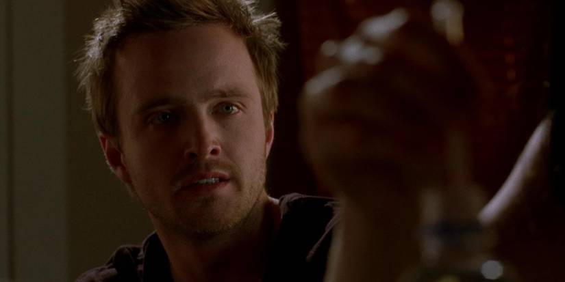Aaron Paul as Jesse Pinkman looking at someone slightly off-camera in Breaking Bad.