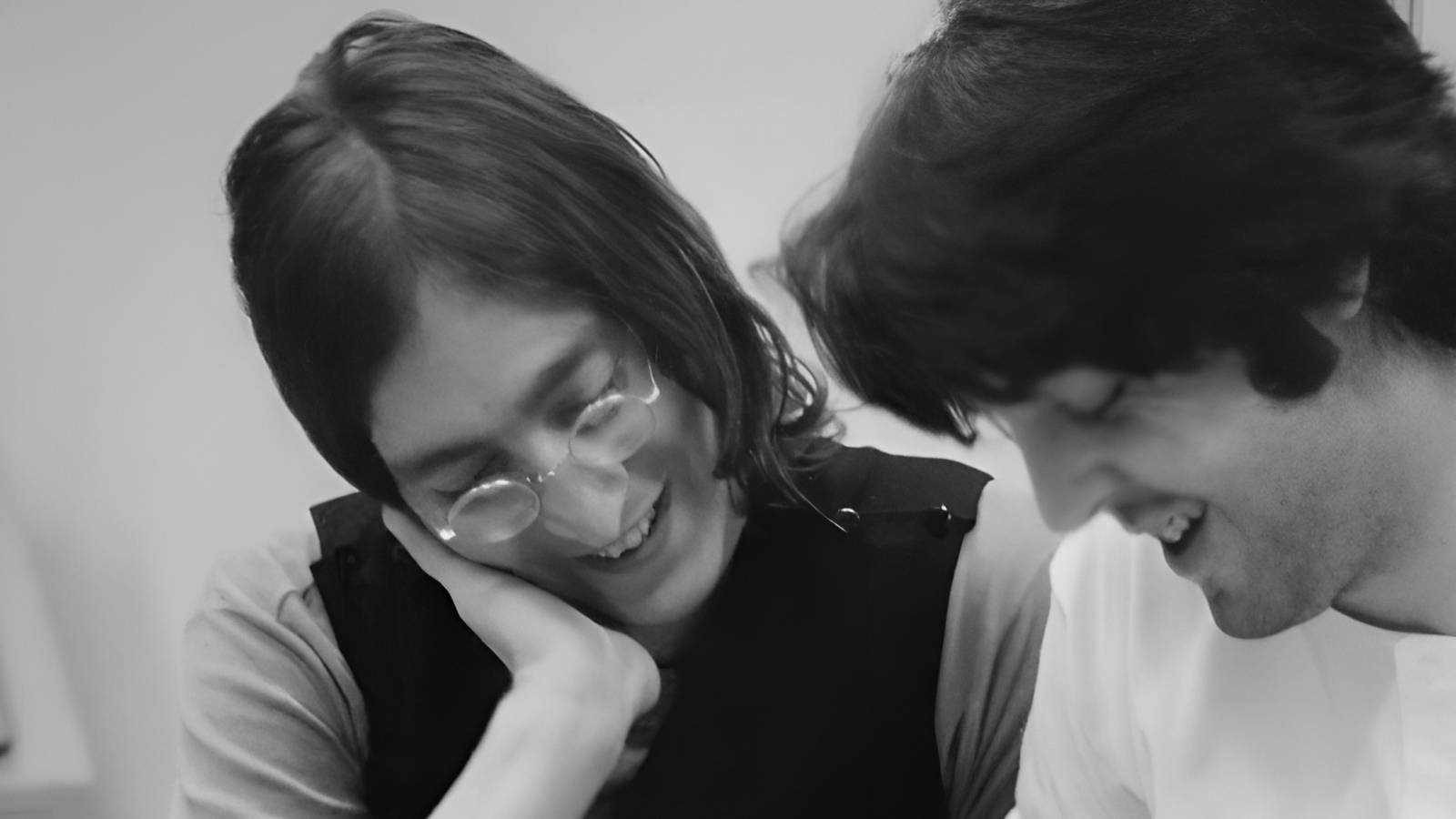 John Lennon and Paul McCartney smiling