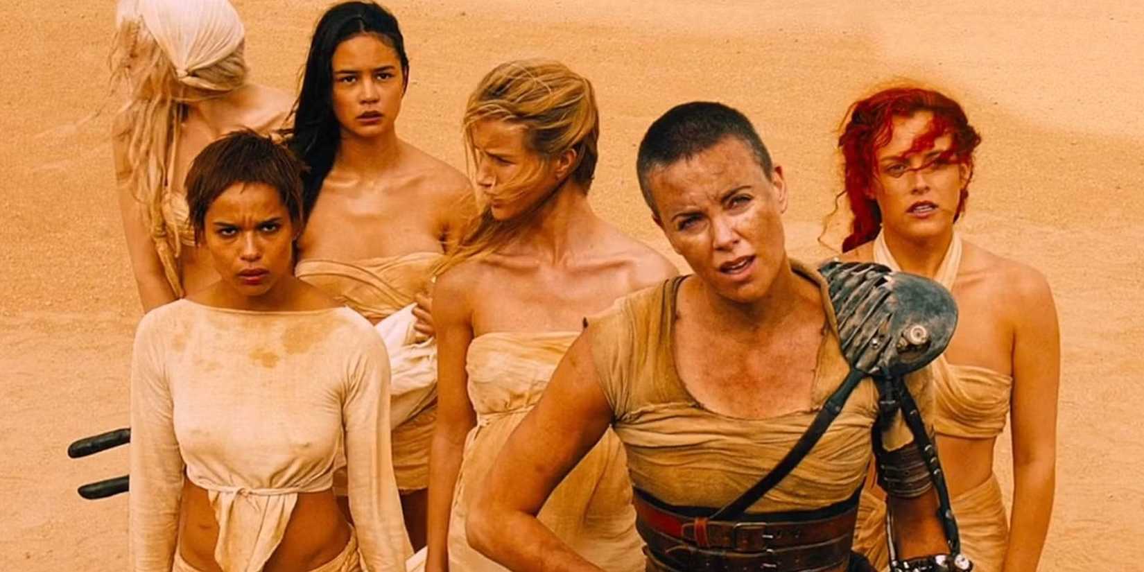 Imperator Furiosa and Immortal Joe's five wives standing in the desert in Mad Max: Fury Road