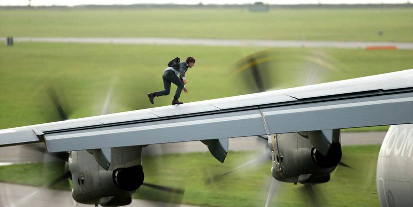 Tom Cruise on top of a plane in Mission: Impossible - Rogue Nation
