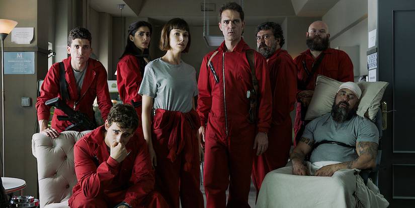 'Money Heist' cast of characters all looking forward with varying worried facial expressions.