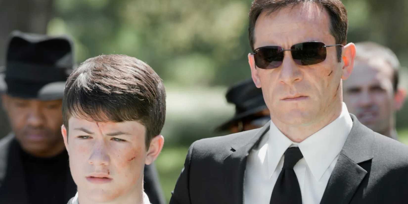 Dylan Minnette and Jason Isaacs in 'Awake.'