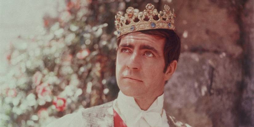 Philippe de Broca wearing a crown and looking up in 'King of Hearts' (1966)