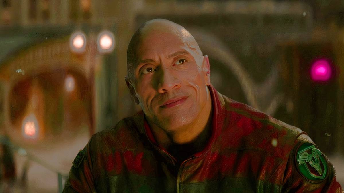 Dwayne Johnson smiles while thinking in the North Pole in Red One