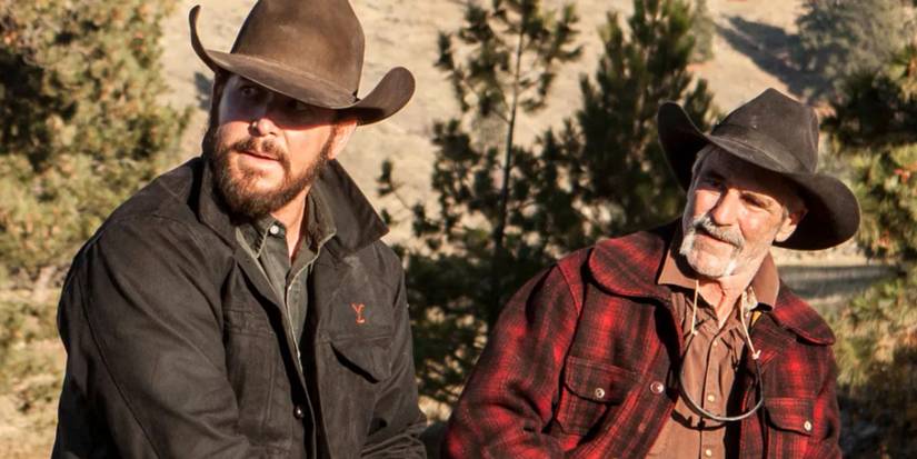 Rip and Lloyd sitting on their horses and looking at something to their right in Yellowstone.