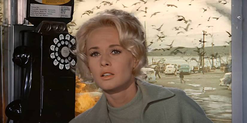 Tippi Hedren is trapped in a telephone booth in Alfred Hitchcock's The Birds.