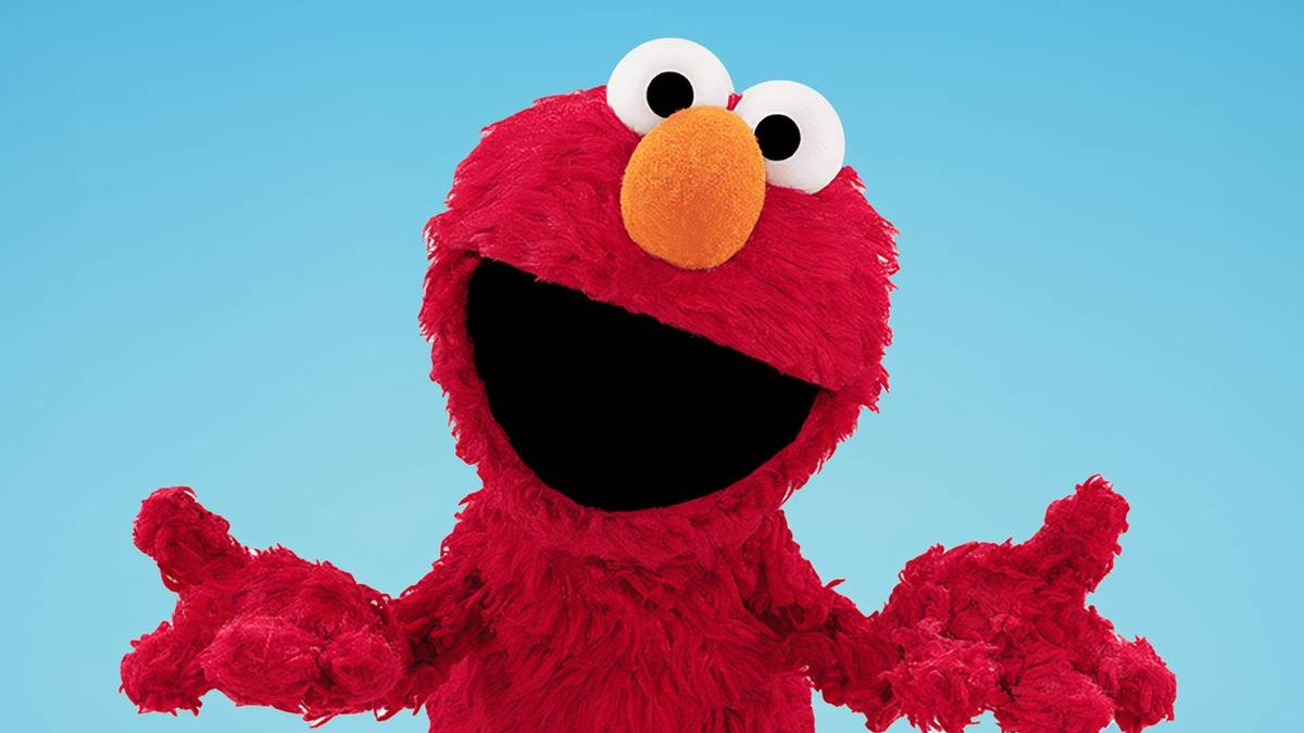 Elmo from Sesame Street holding his hands out