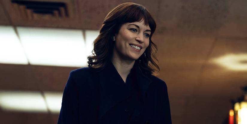 Britt Lower as Helena Egan in a Chinese restaurant in Severance