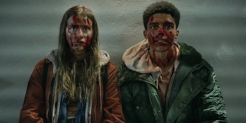 The Bastard Son & The Devil Himself's main characters sitting and drenched in blood. 