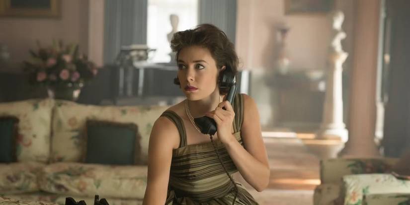 Vanessa Kirby as Princess Margaret, calling someone on a rotary phone, in a still from 'The Crown.'