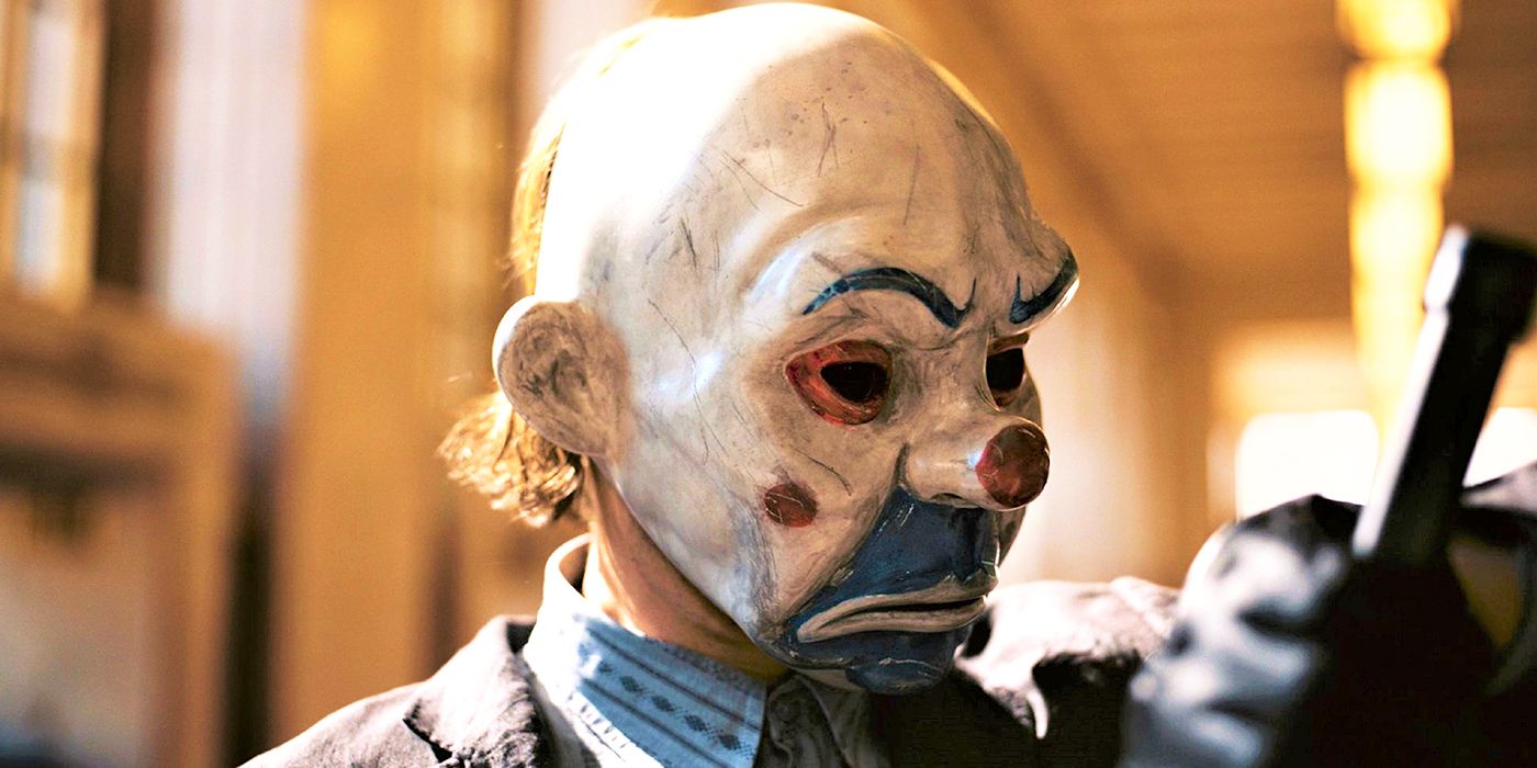 Heath Ledger's Joker wearing a clown mask in The Dark Knight
