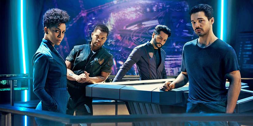 Wes Chatham, Dominique Tipper, Cas Anvar, and Steven Strait in sci-fi uniforms in The Expanse.