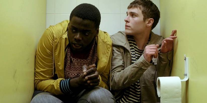 Daniel Kaluuya and Iain De Caestecker in a bathroom stall in 'The Fades' (2011)