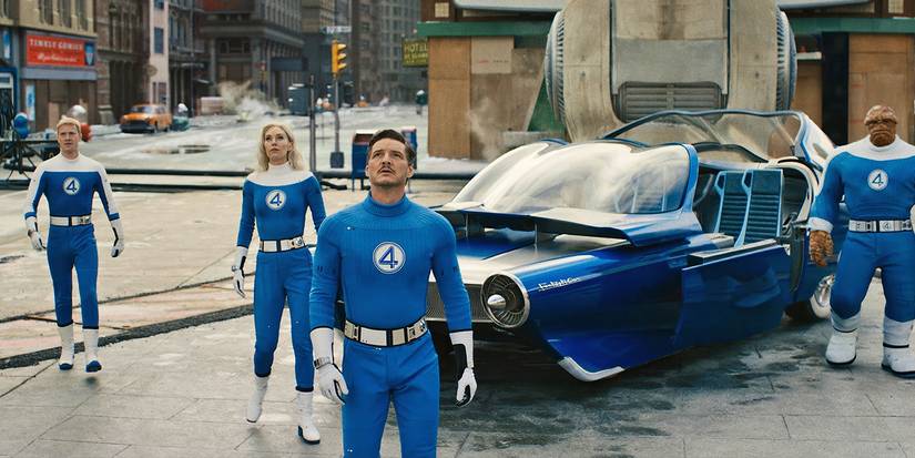 The team looking up at something in the street - a fight about to happen  - 'Fantastic Four: First Steps.'