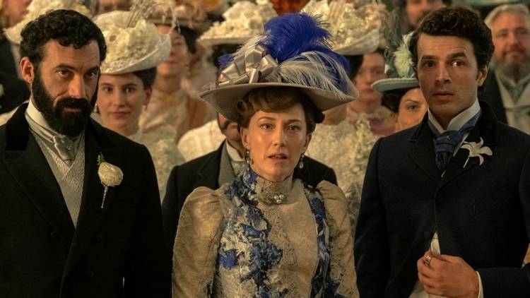Harry Richardson as Larry with Carrie Coon and Morgan Spector at Gladys' wedding in The Gilded Age Season 3.