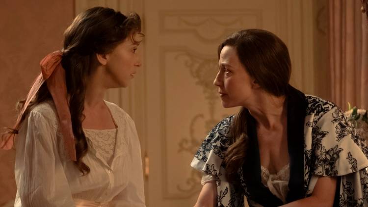 Taissa Farmiga as Gladys having an intense conversation with Carrie Coon as Bertha in The Gilded Age