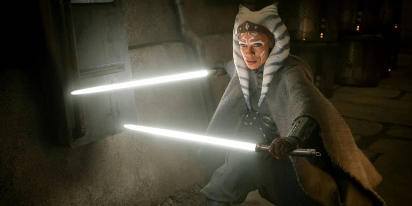 Rosario Dawson as Ahsoka Tano using two lightsabers in 'The Mandalorian.'