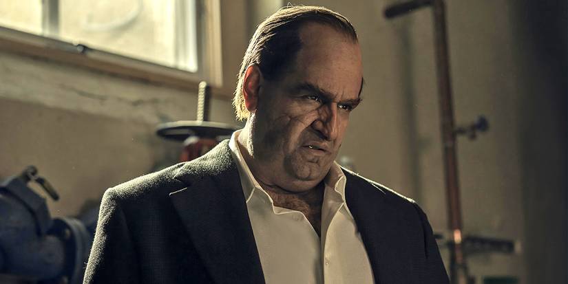 Colin Farrell as Oz 'The Penguin' Cobb sneering down at someone in The Penguin.