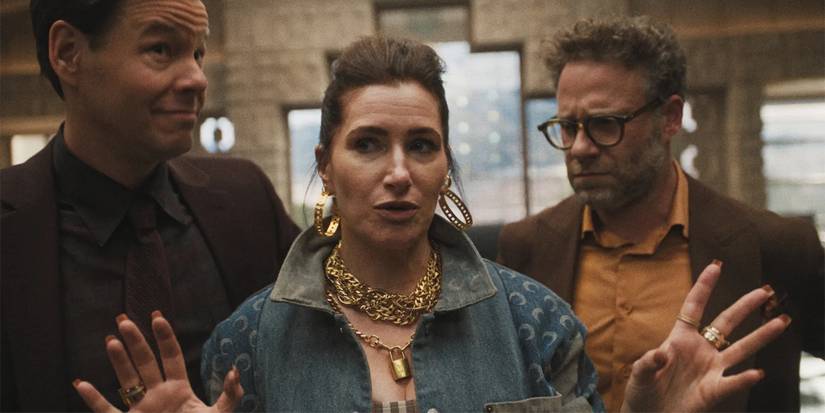 A three-shot of Maya (Kathryn Hahn) explaining something to Matt (Seth Rogen) and Sal (Ike Barinholtz).