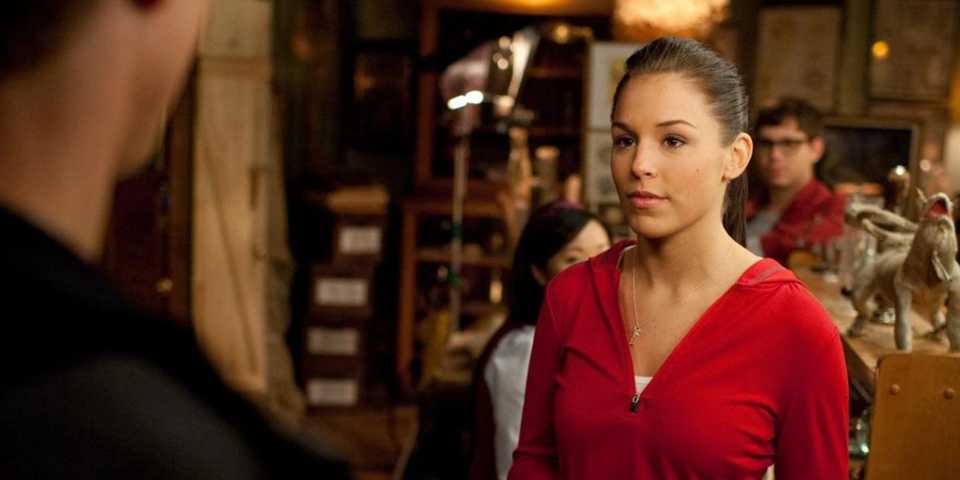 Elise Gatien as CJ talking to someone in Tower Prep.