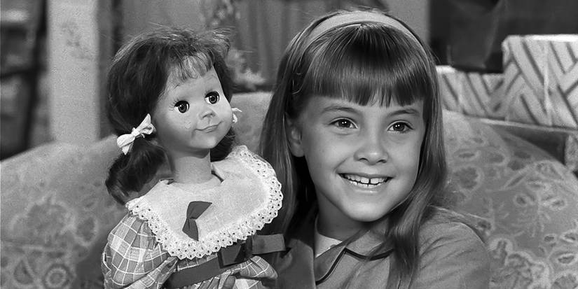 A young girl holds a Talky Tina Doll in The Twilight Zone.