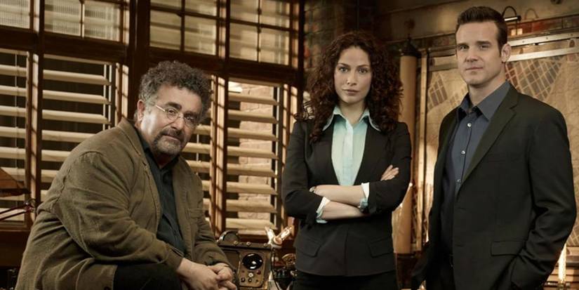 Artie Nielson (Saul Rubinek), Myka Bering (Joanne Kelly), and Pete Lattimer (Eddie McClintock) on 'Warehouse 13'
