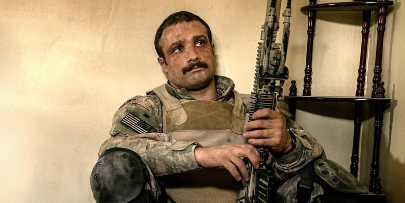Cosmo Jarvis with a rifle in 'Warfare'