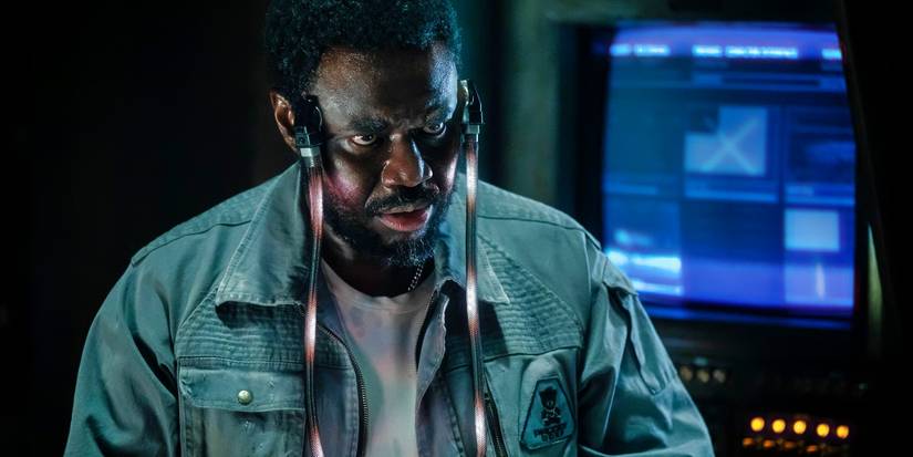 Babou Ceesay with wires attached to his temples in Alien: Earth Episode 3.