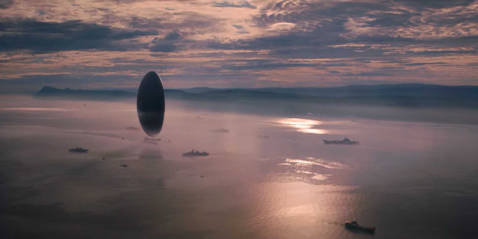 The alien vessel from Arrival hovering over a large body of water