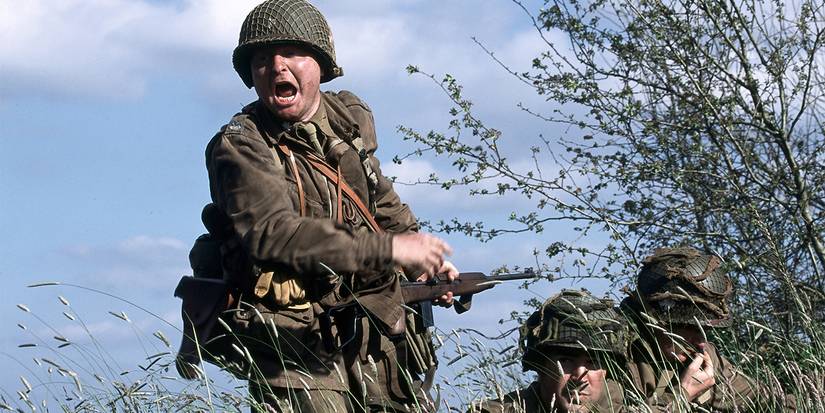 Soldiers yelling in a field in Band of Brothers.