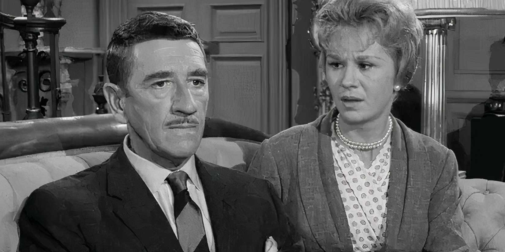 Barbara Stuart looking at Richard Haydn who is sitting next to her in The Twilight Zone episode A Thing About Machines