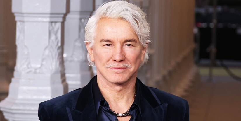 Director Baz Luhrmann looking at the camera in a red carpet photo.