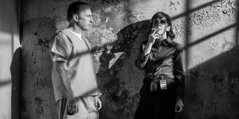 Bob Odenkirk looking at Rhea Seehorn smoking a cigarette in the Better Call Saul series finale