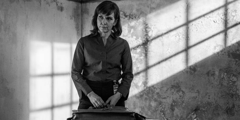 Rhea Seehorn looks to the side in a decaying building in the Better Call Saul series finale.