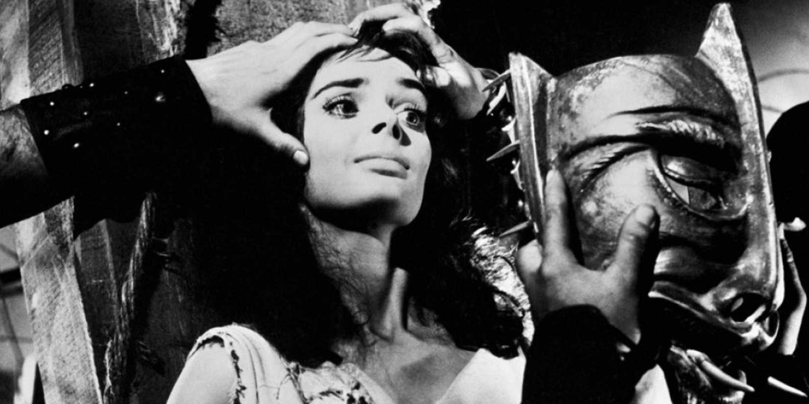 A woman about to be put in a mask in Black Sunday