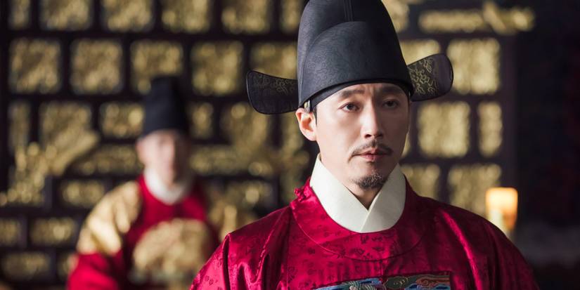 Jang Hyuk in Bloody Heart, with his back turned to someone during a conversation