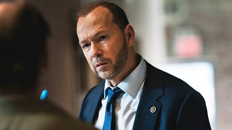 Donnie Wahlberg wears a blue suit as Danny Reagan in Blue Bloods