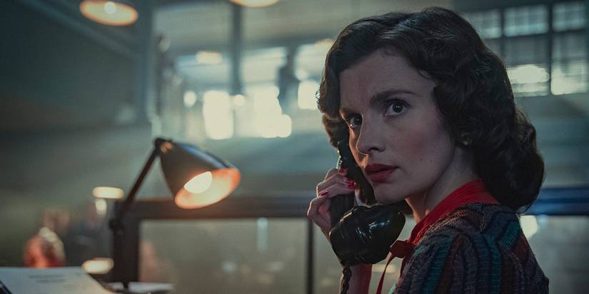 Emily Barber on the phone in Bodies