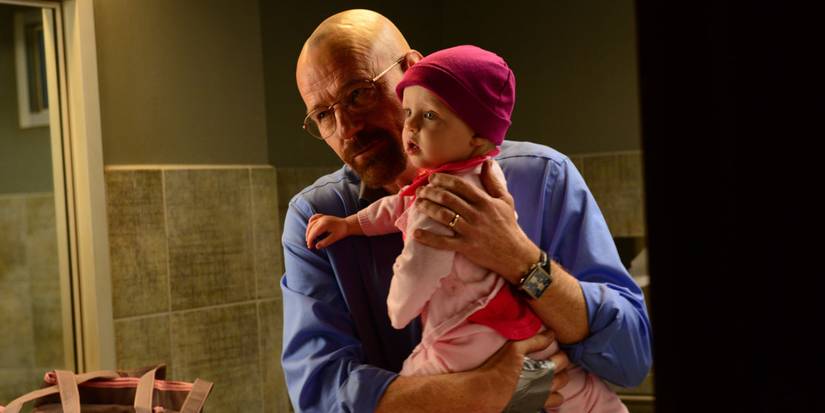 Walt holding his baby daughter Holly in season 5 of Breaking Bad - Ozymandias (2013).