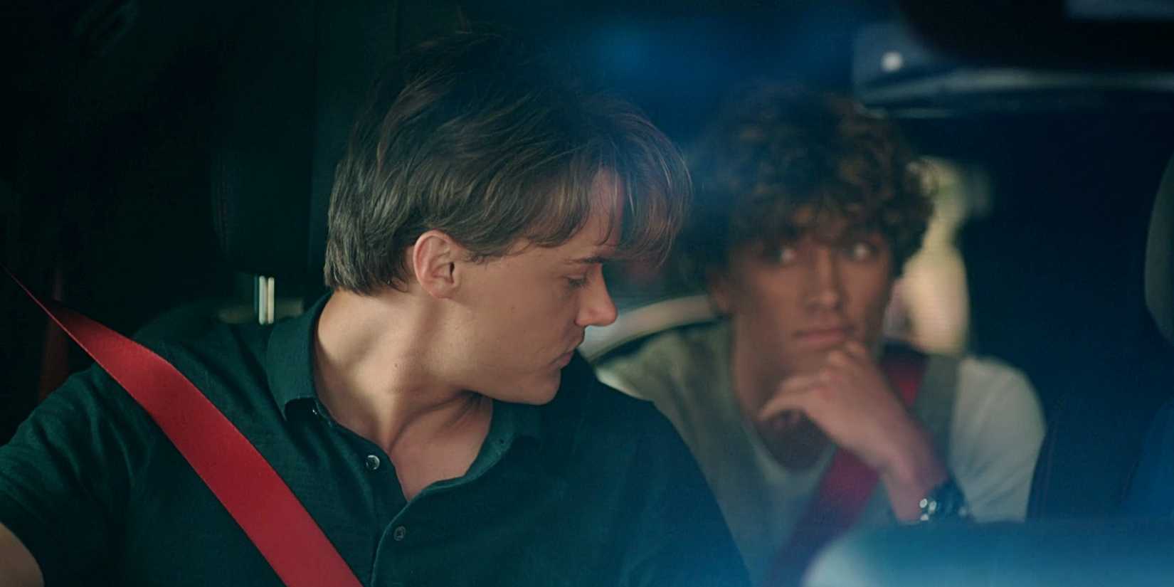 Conrad and Jeremiah Fisher sitting in the car together in The Summer I Turned Pretty TSITP Season 3.