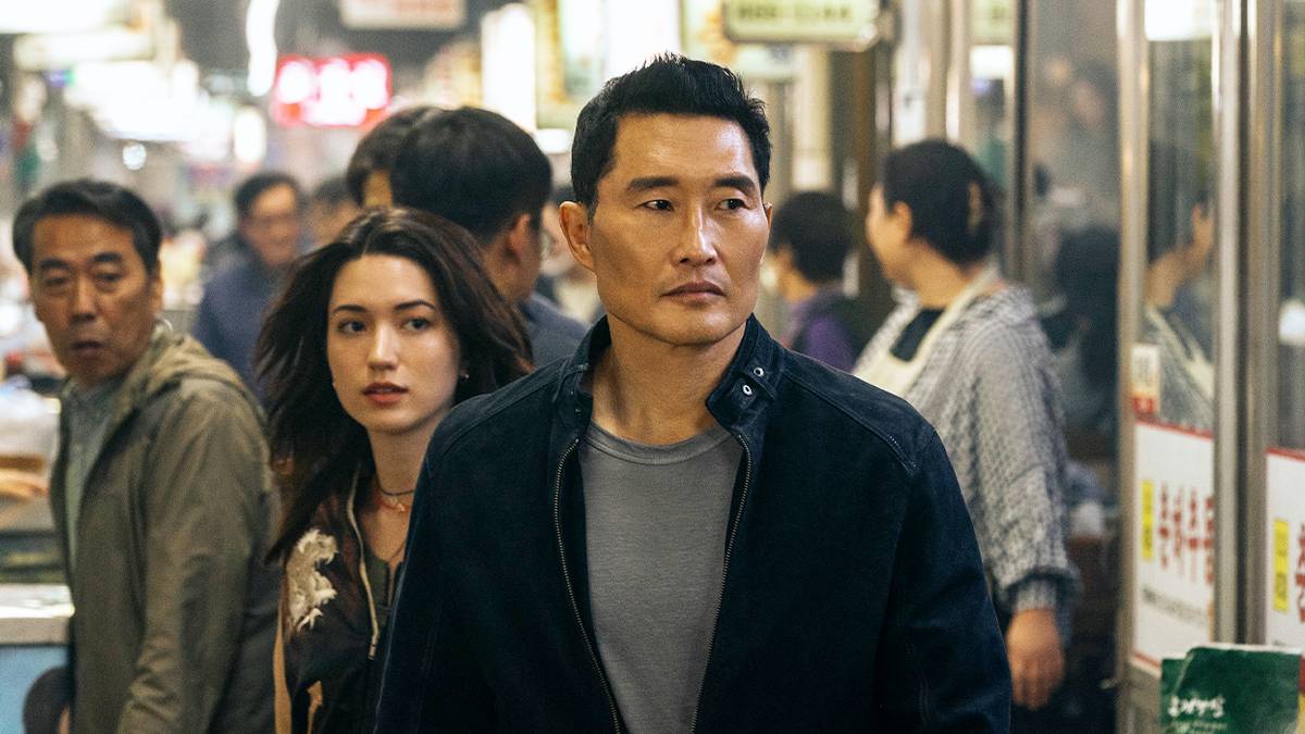 Rebecca and David Jung walking quickly through a train in Butterfly Season 1