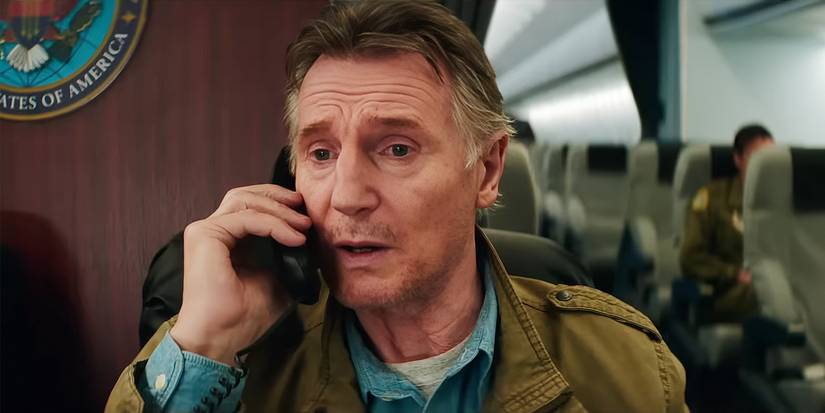 Liam Neeson on a cell phone on what appears to be Air Force One in Cold Storage