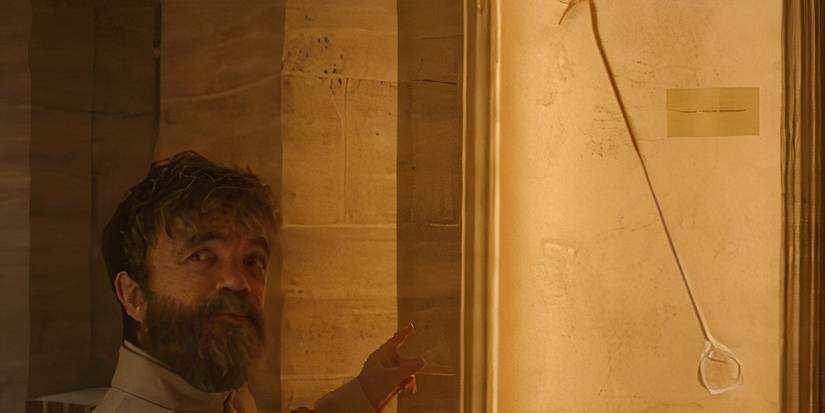 Leon Prater (Peter Dinklage) shows off a weapon used by the New York Ripper in Dexter: Resurrection.