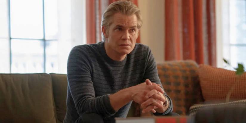 Timothy Olyphant as Derek Browne sitting on a couch and leaning forward on 'Full Circle.'
