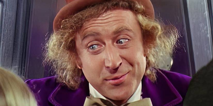 A closeup of actor Gene Wilder as Willy Wonka, looking down expressively at the children in Willy Wonka and the Chocolate Factory.