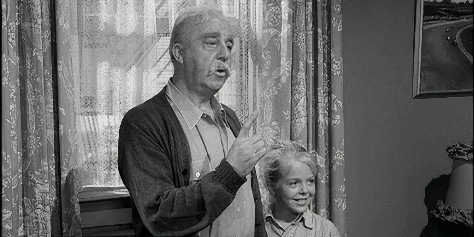 J. Pat O'Malley standing next to Susan Gordon in The Twilight Zone episode The Fugitive