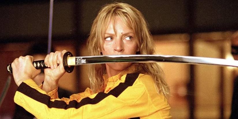 The Bride (Uma Thurman) wielding a katana and dressed in yellow in Kill Bill